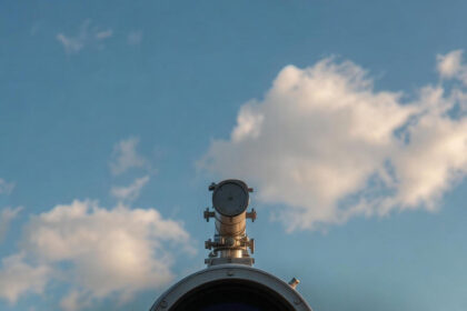 Image of Spyglass Entertainment logo with telescope and ocean; Spyglass Entertainment Avid visual elements; Comparison table of Spyglass logo variants