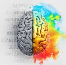 A person working with intense focus at a clean desk, with a visual metaphor of light bursting from their head, representing creative flow.